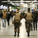 Belgian soldiers patrol in the arrival hall at Midi railway station in Brussels, November 21, 2015, after security was tightened in Belgium following the fatal attacks in Paris. Belgium raised the alert status for its capital Brussels to the highest level on Saturday, shutting the metro and warning the public to avoid crowds because of a "serious and imminent" threat of an attack.